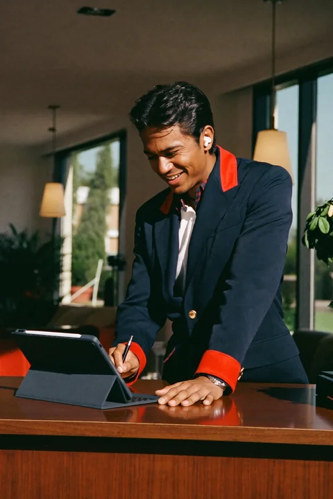Hotel front-desk staff preparing a guest’s check-in