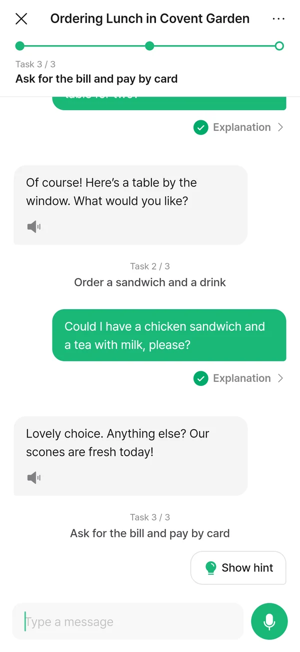 A role-play ordering lunch at a caf&eacute; in Covent Garden, with an Explanation button under each message.