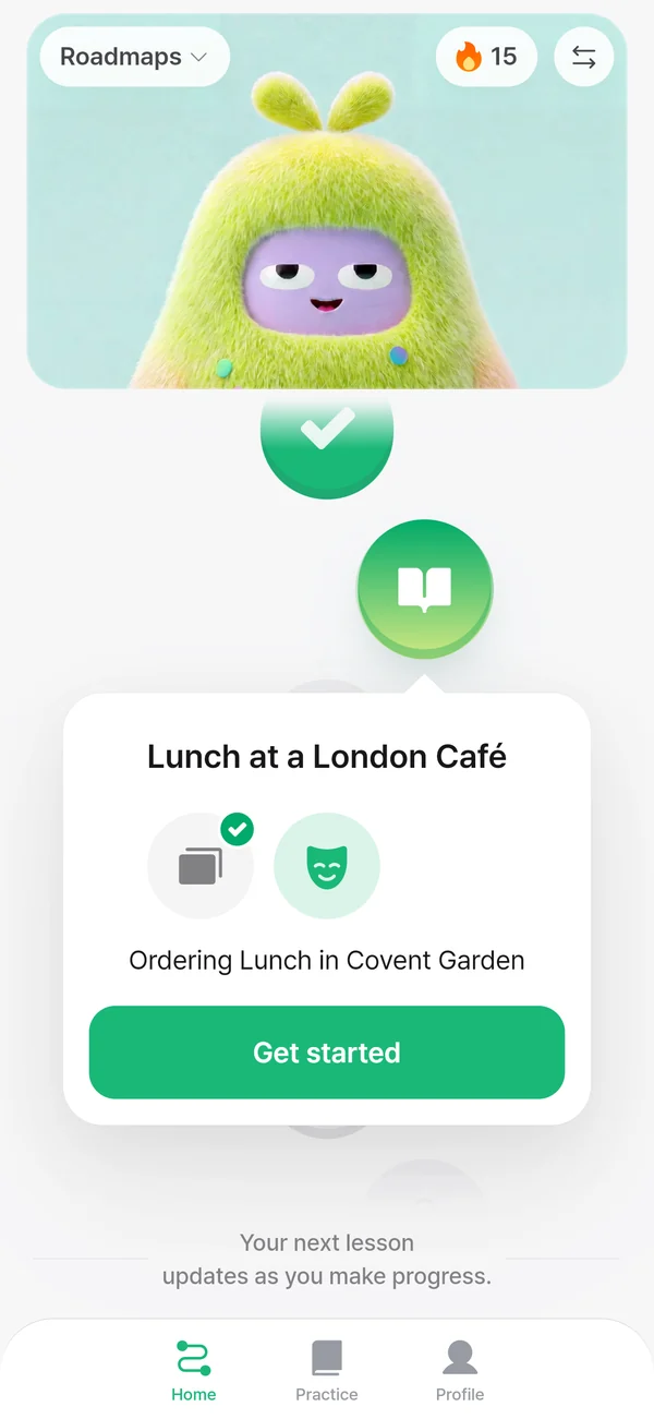 The app&rsquo;s home path, with the next lesson, &ldquo;Lunch at a London Caf&eacute;&rdquo;, ready to start.